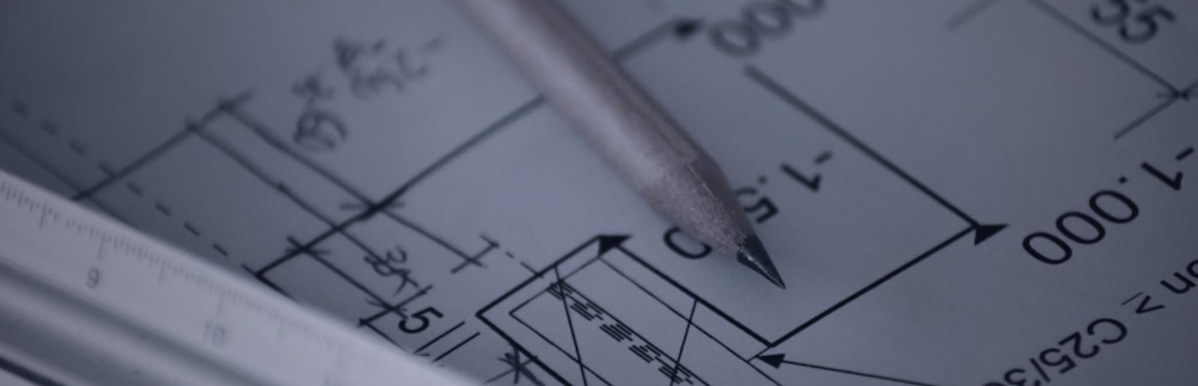 An engineering drawing with dimensions, a scale rule and a pencil