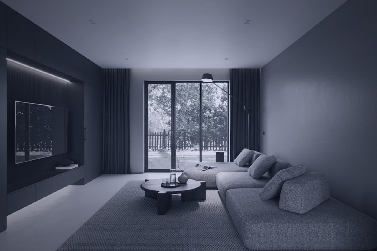 Modern living room with concealed cove lighting and a wall-mounted display